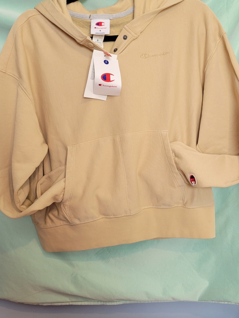 Champion Beige Pullover Hoodie with Subtle Logo